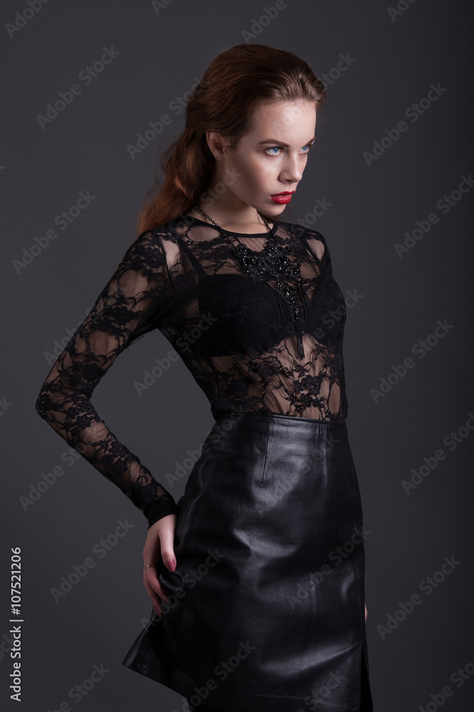 fashion model model holding little purse on gray background fashion model model holding little purse on gray background