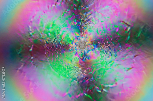 Fotografie Colorful psychedelic blur showing stress distribution in plastic using polarized