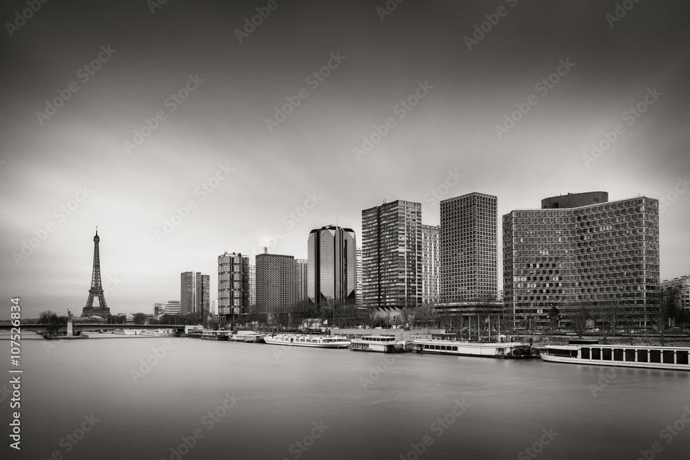 Black & White skyline with high-rise Left Bank buildings in the 15th Arrondissement with the Eiffel Tower ,Seine River and Pont de Grenelle, Paris, France