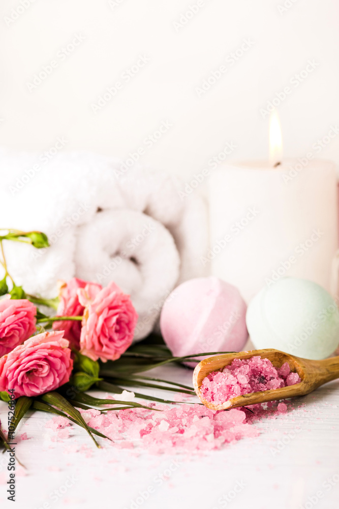Spa setting with pink roses and aroma oil, vintage style Spa setting with pink roses and aroma oil, vintage style