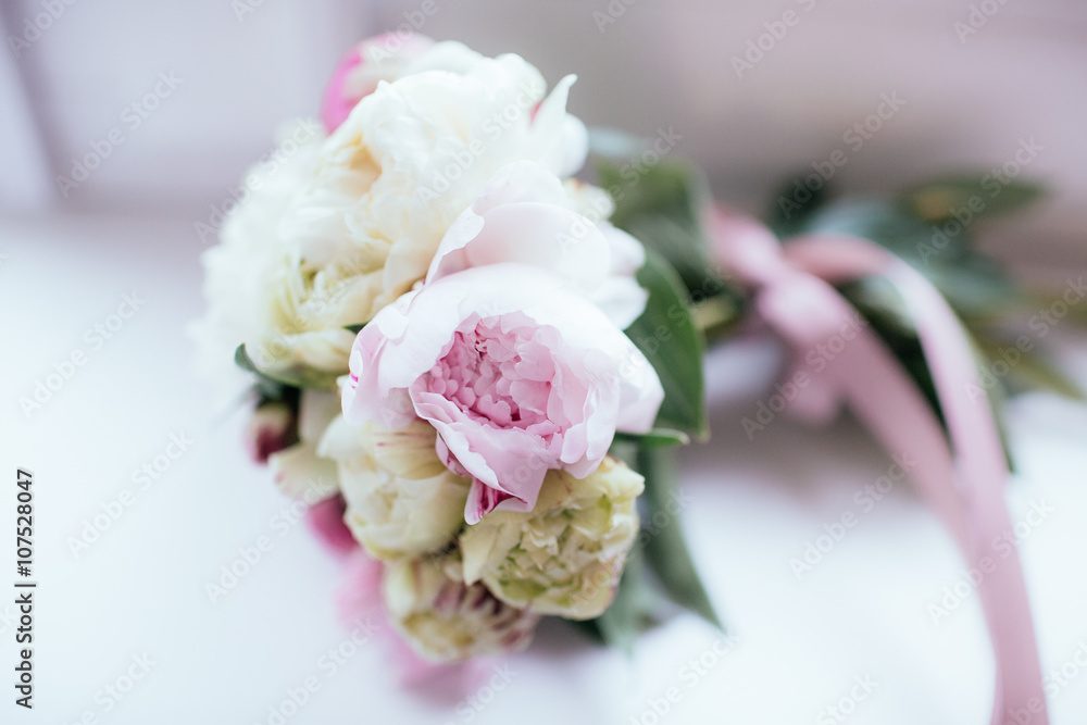 Closeup of fresh white & pink flowers in wedding bouquet