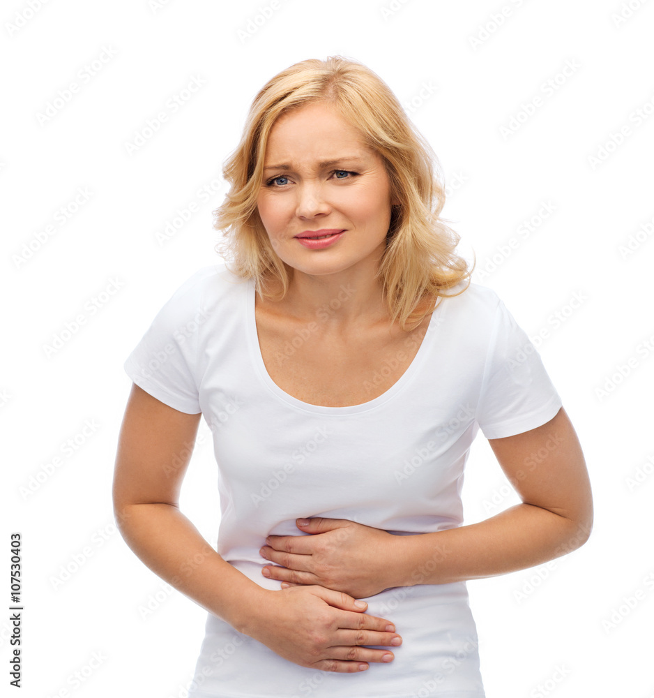 unhappy woman suffering from stomach ache unhappy woman suffering from stomach ache