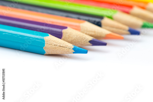 color pencil on white with copy space, colorful kids school artist concept.