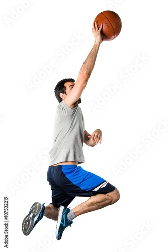 Man playing basketball jumping © luismolinero