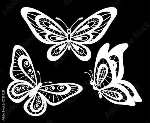 set of beautiful black and white guipure lace butterflies isolated.