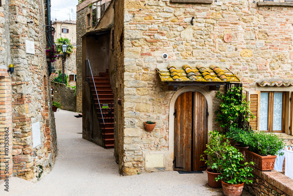 Street of the medieval village Volterra. Italy