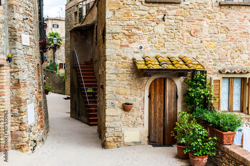 Street of the medieval village Volterra. Italy © Kavita