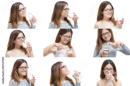 healthy woman drinking water on white background