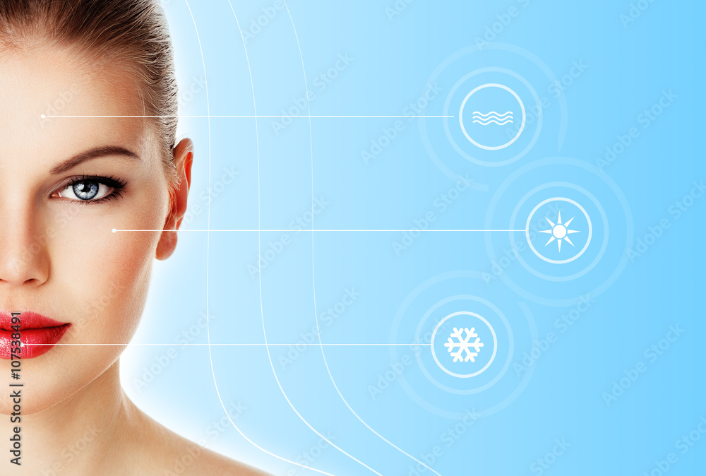 Skin protection and day-spa. Close-up of beautiful woman face over blue background with symbol of weather conditions. Skin protection and day-spa. Close-up of beautiful woman face over blue background with symbol of weather conditions.