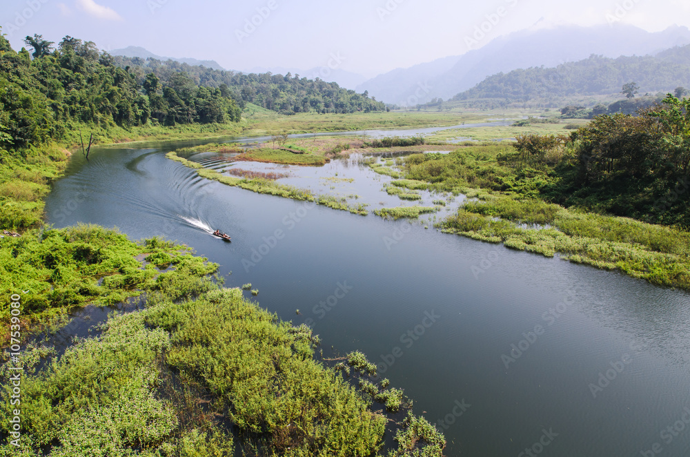 Landscape view of river mountain and boat Landscape view of river mountain and boat