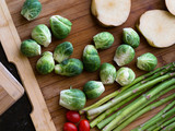close up view of nice fresh vegetables on color background
