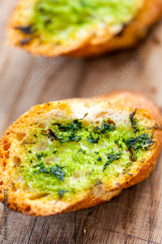 Garlic bread with wild garlic leaves