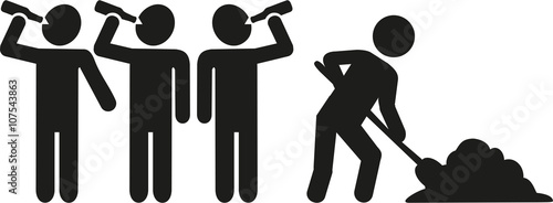 Teamwork: Four men drinking one working