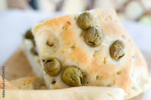 flatbread italy focaccia olives closeup flat oven baked Italian photo