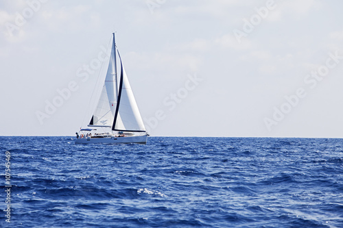 Yacht with white sails © Nadezhda Bolotina