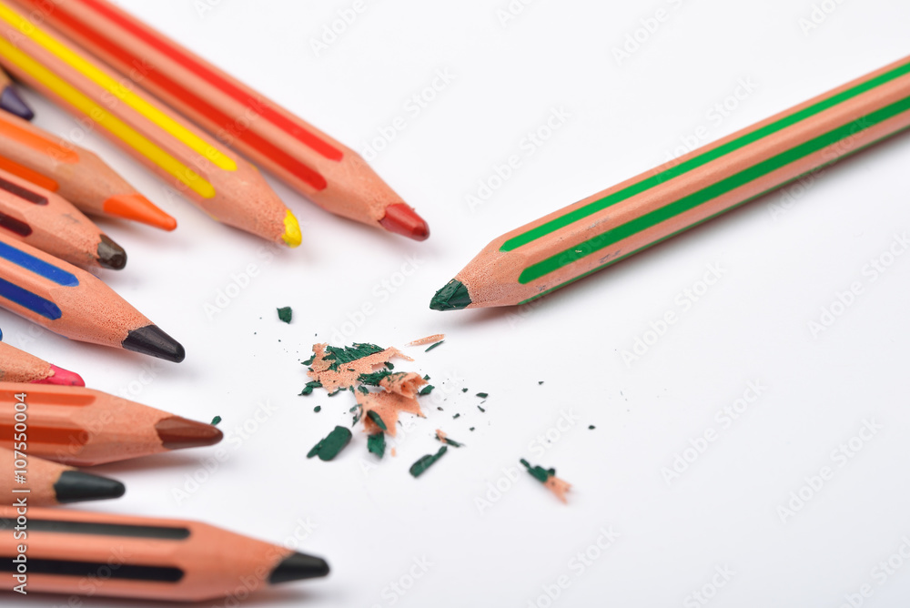 Picture of some pencils with stripes of different colors and pen Picture of some pencils with stripes of different colors and pen