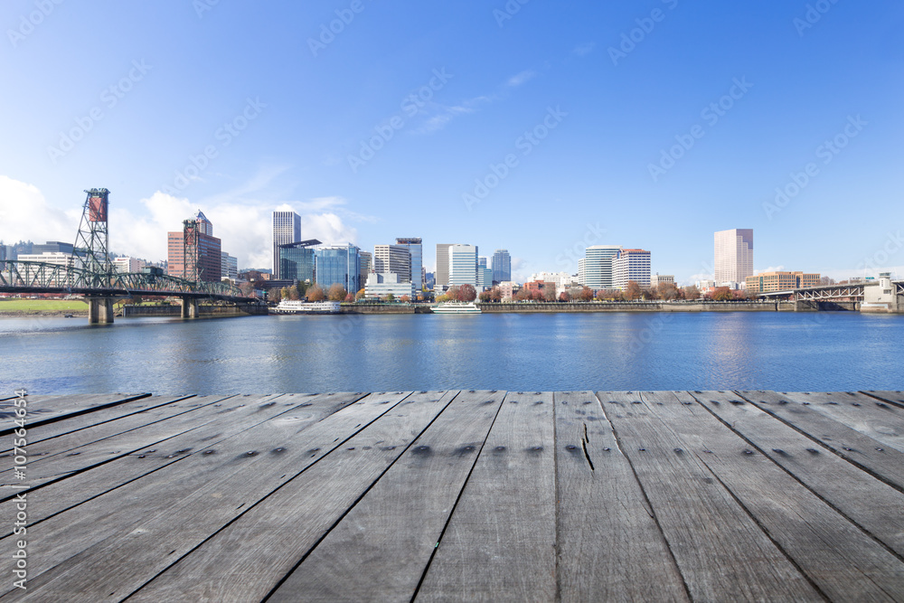 empty wood floor with cityscape and skyline in portland