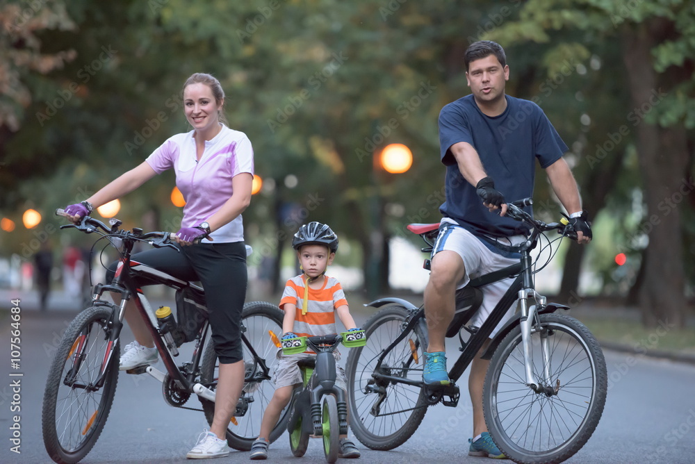 young family with bicycles