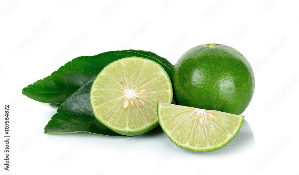 lime and leaves isolated on the white background lime and leaves isolated on the white background