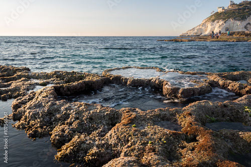 Sunset on Achziv Beach photo