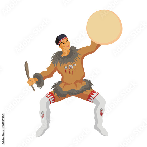 the Chukchi young man in a national suit dances with a tambourine
