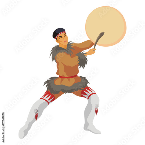 the young man with a tambourine. the Chukchi young man in a national suit dances with a tambourine
