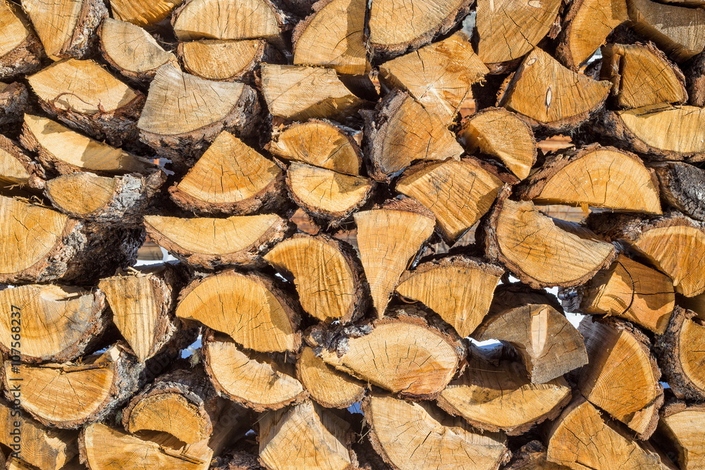 Wooden pattern. Stack of firewood at winter. Wooden pattern. Stack of firewood at winter.