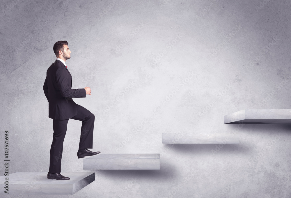 Obraz premium Stepping up a staircase