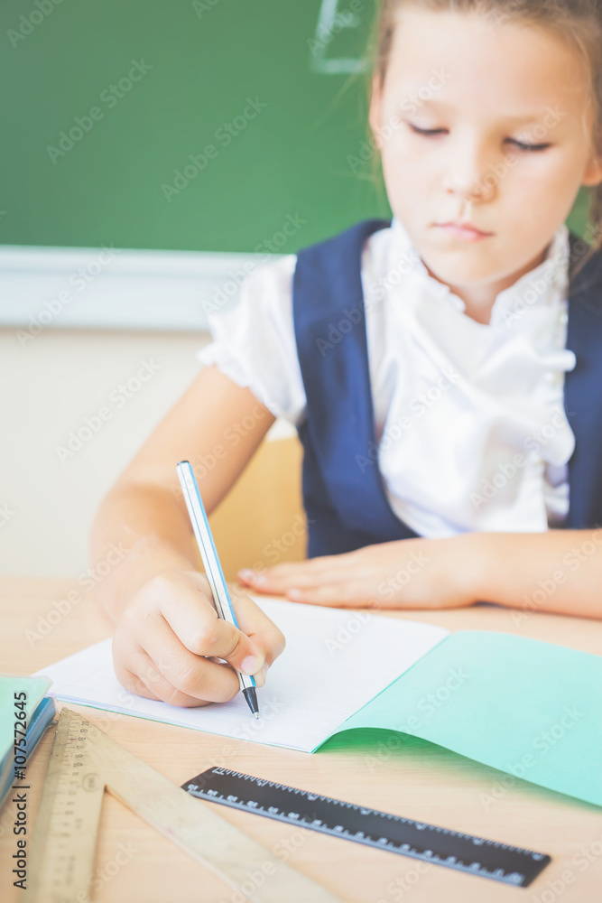 Desktop background of student sitting at desk for classwork Desktop background of student sitting at desk for classwork