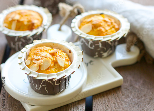 Carrot muffin decorated with nuts