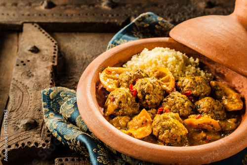 Traditional Tajine Dish of Meatballs and Couscous photo