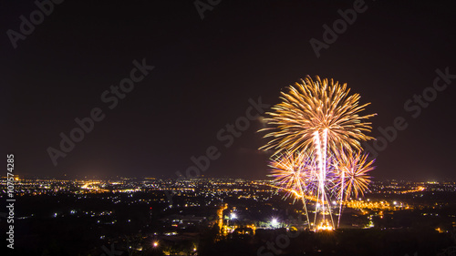 Beautiful firework display for celebration with city at night © kuarmungadd