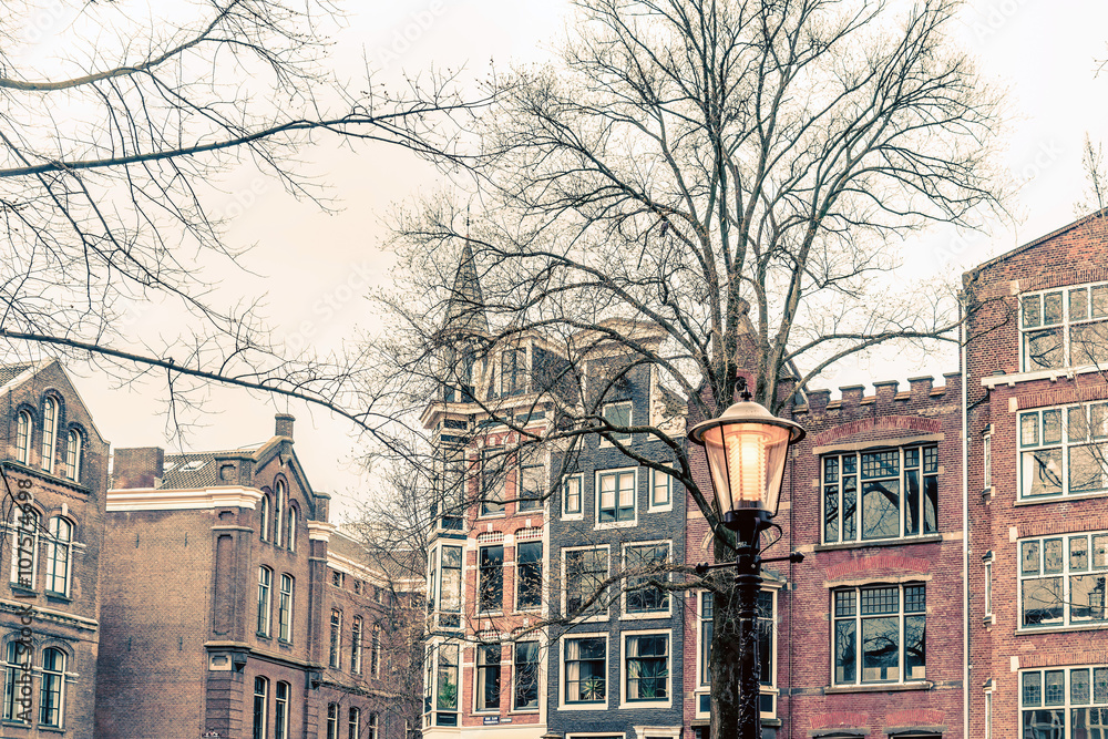 Fototapeta premium street view of Traditional old buildings in Amsterdam, the Nethe