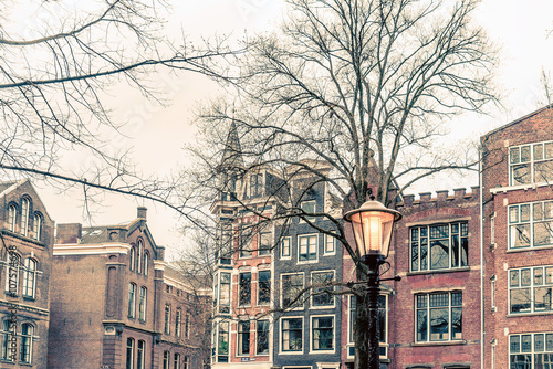 street view of Traditional old buildings in Amsterdam, the Nethe © ilolab