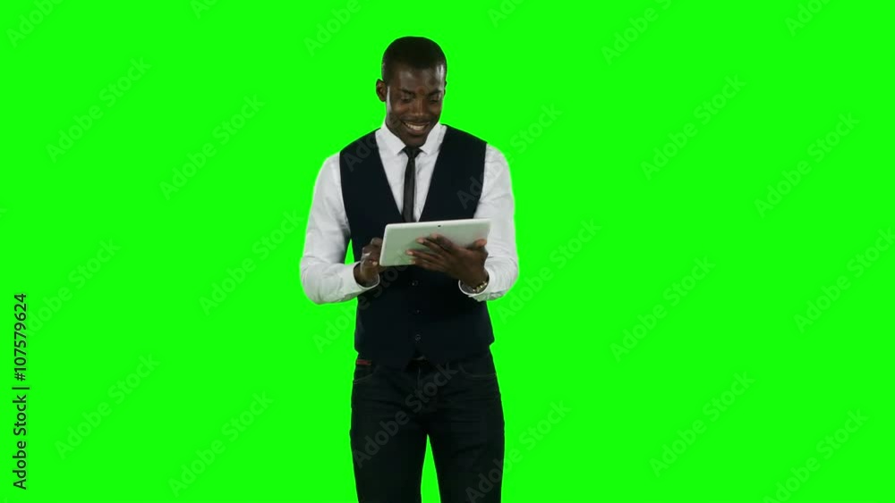 Businessman using digital tablet pc for internet. Green screen Businessman using digital tablet pc for internet. Green screen