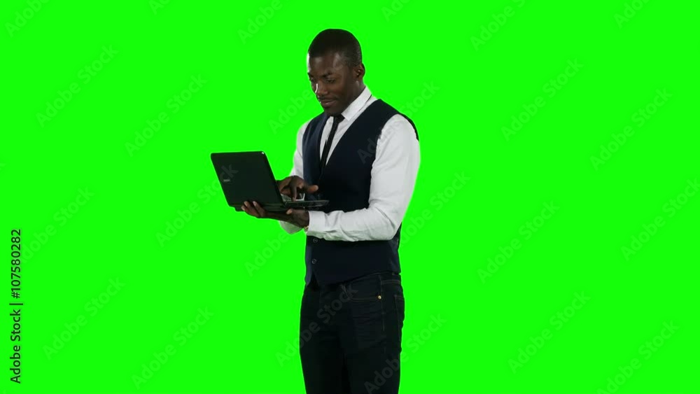 Businessman using laptop. Broker. Green screen. Businessman using laptop. Broker. Green screen.