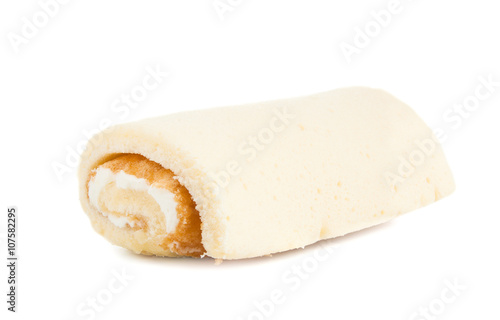 Vanilla cake roll on white isolated