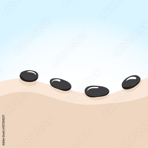 Woman's back having spa stone treatment