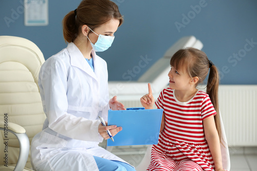Doctor and little girl in the office