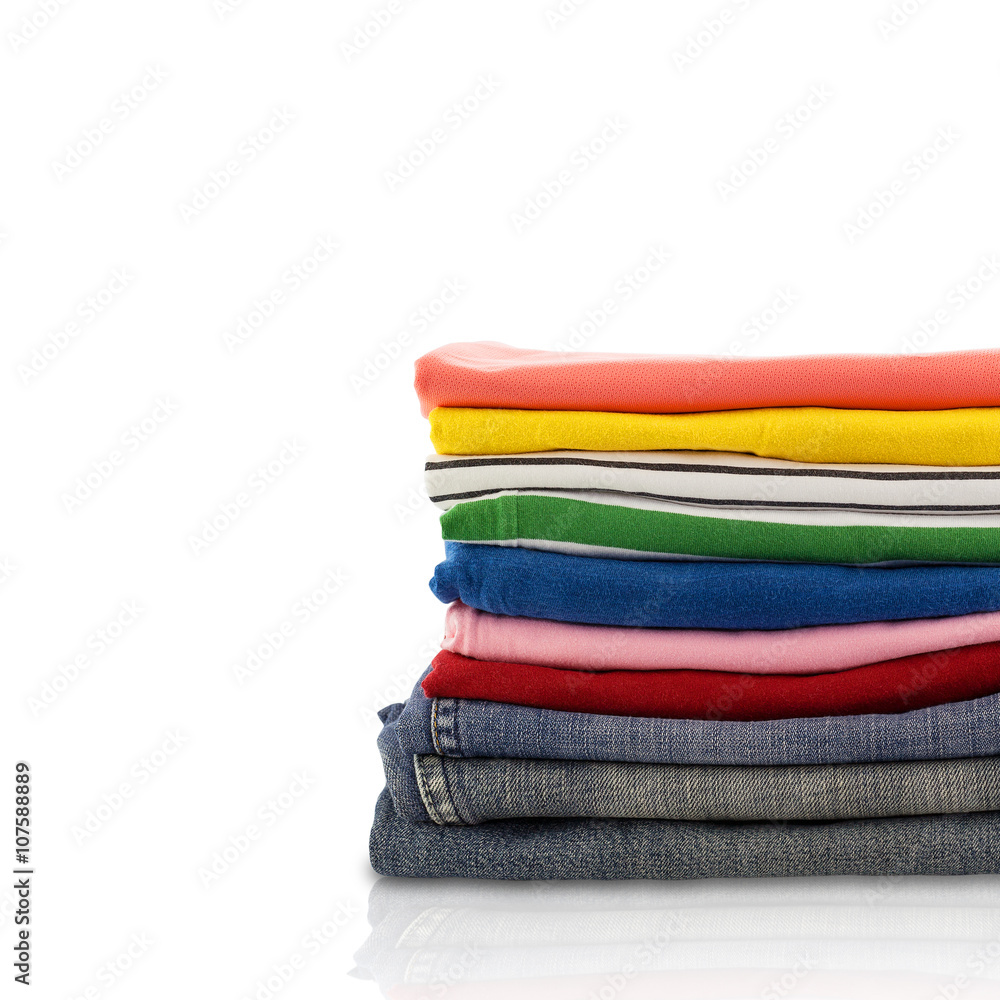 Pile of colorful clothes and Beautiful summer isolated on white Pile of colorful clothes and Beautiful summer isolated on white