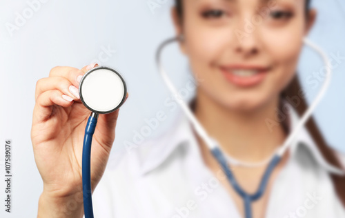 Young female doctor with st...