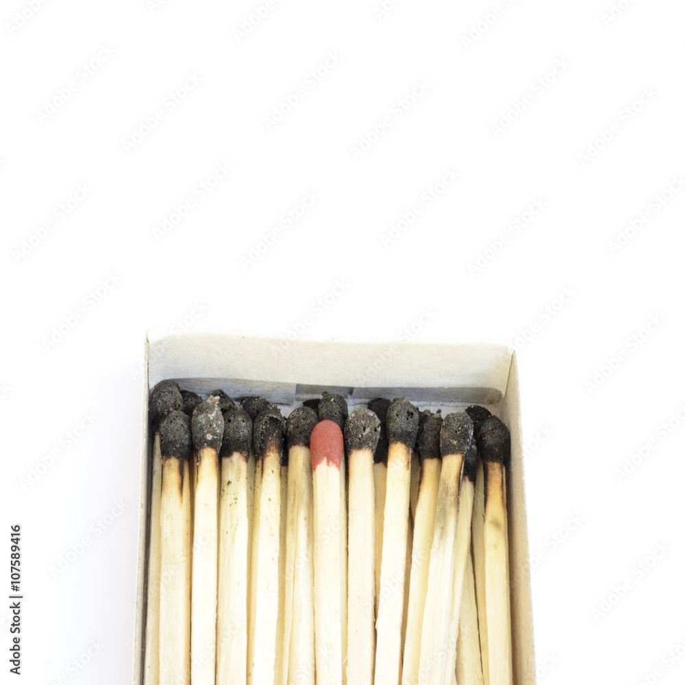 One red matchstick in the box among burnt ones