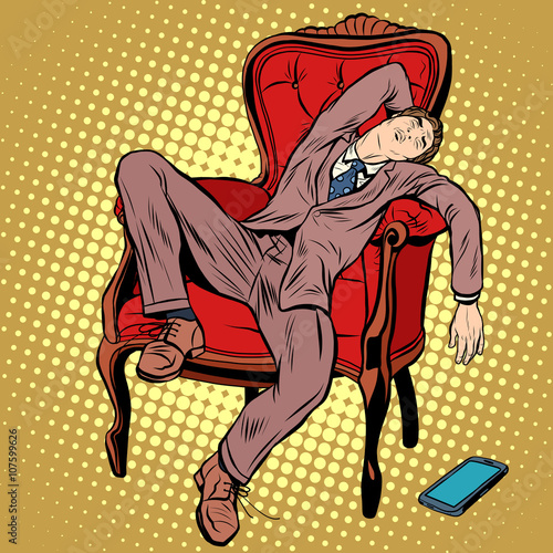 Businessman resting and sleeping in the chair