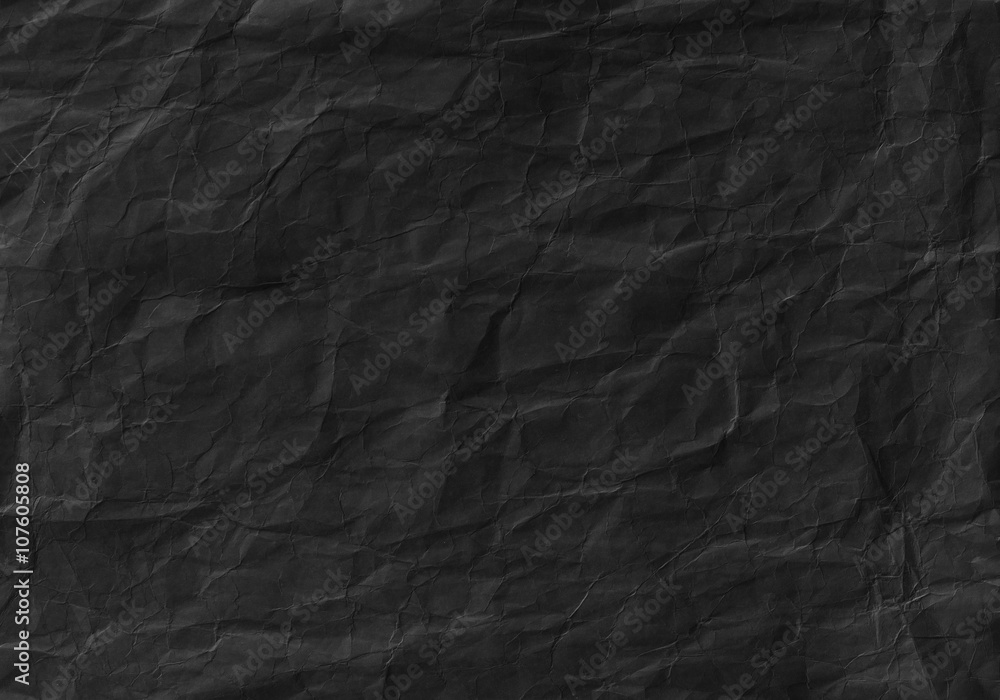 Black crumpled paper texture. Background and wallpaper foto de Stock