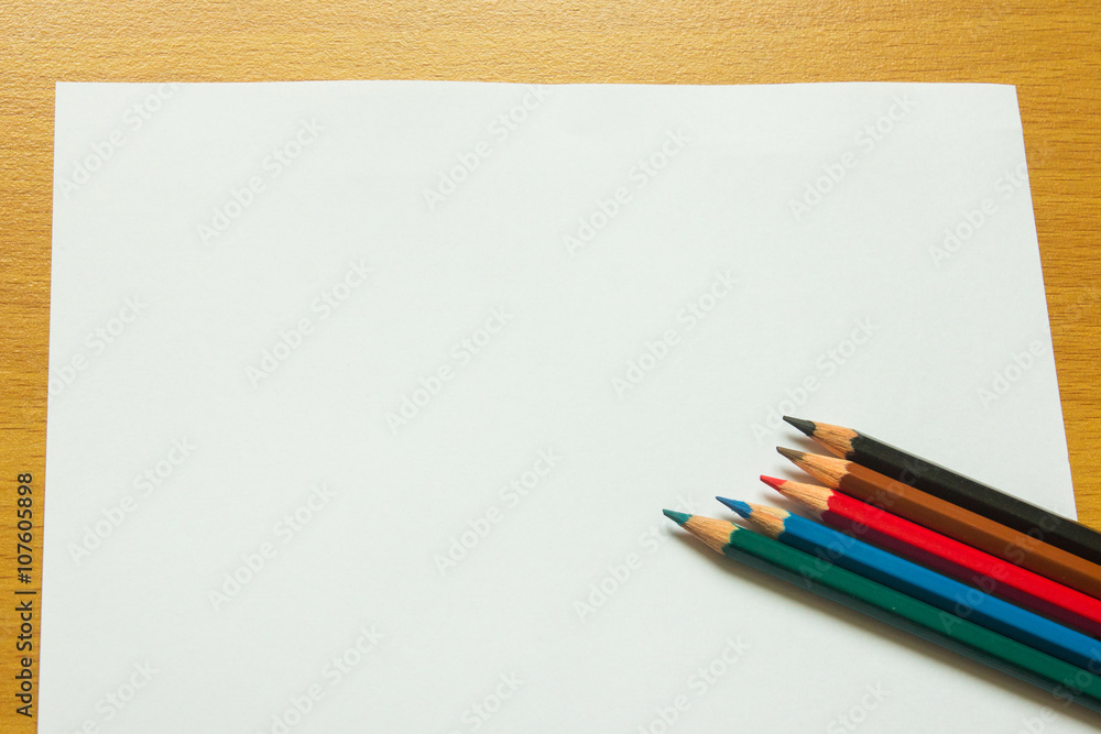 Fototapeta premium Colored pencil with paper