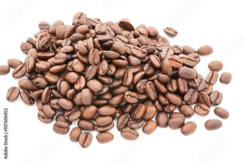 Coffee grains and leaves isolated on the white backgrounds.