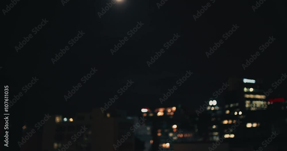 Defocused view of citylights at night Defocused view of citylights at night