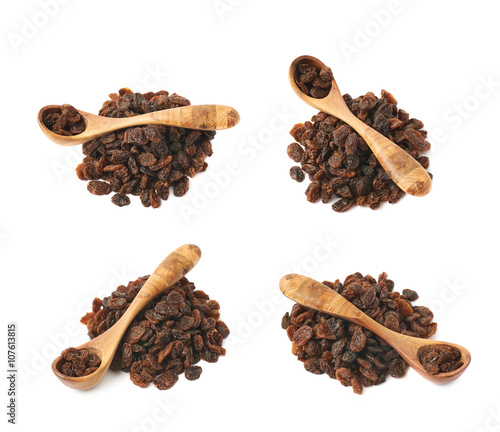 Wooden spoon over the pile of raisins