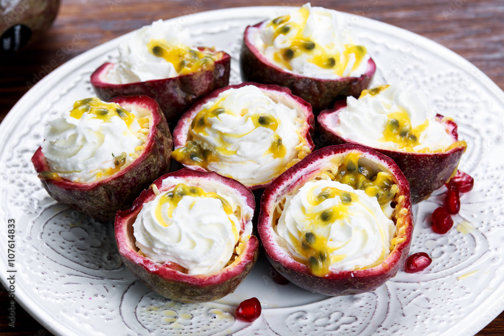 Ripe passion fruit on a wooden background Ripe passion fruit on a wooden background