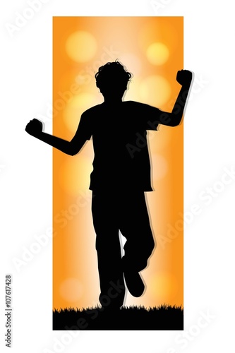 silhouette of boy running in a meadow